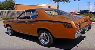 Check Out The Video Review And Road Test Of This Astonishing 1973 Plymouth Gold Duster Tribute Powered By A Rebuilt 360 V8 Motor Ameri Muscle Cars Cars