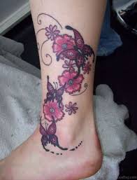 Hibiscus flowers tattoo on ankle leg. 50 Best Flower Tattoos On Leg