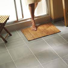 How long should i wait to tile after laying the concrete floor for tiling in the bathroom? How To Lay Tile Install A Ceramic Tile Floor In The Bathroom Diy Family Handyman