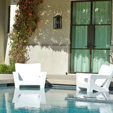Costarondack Chair Adirondack Style In Pool Tanning Ledge Chair In 2020 Tanning Ledge Chairs Tanning Ledges Outdoor Pool Furniture
