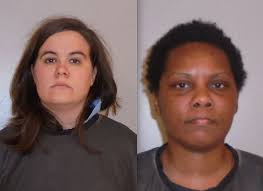 Two women arrested after threatening to shoot boys for knocking