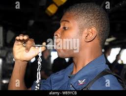 Boatswain's Mate 3rd Class Aaron Lanfranco, from Austin, Texas, and  assigned to the deck department aboard the San Antonio-class amphibious  transport dock ship USS San Diego (LPD 22), fishes off of the