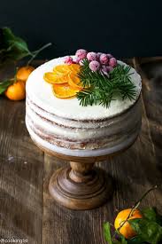 Tangerine Layer Cake With Tangerine Curd And Cream Cheese Frosting Frosting Recipes Cream Cheese Frosting Recipe Christmas Cake Decorations