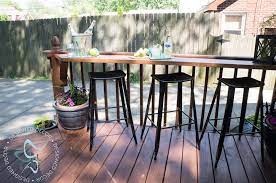 We love to grill in the summertime, but it's hard to juggle all those serving trays and condiments while you're cooking! Build A Diy Flip Up Deck Bar Designed Decor