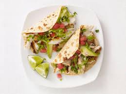 For each taco place a small amount of cheese on the bottom of shell, top with tilapia pieces, salsa, and cabbage mixture. Tilapia Fish Tacos Food Network