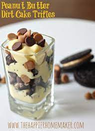 Adding Peanut Butter And Chocolate Chips To A Classic Dirt Cake Recipe To Create A Delectable Trifle Desserts Dirt Cake Sweet Recipes