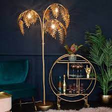 Use your home lighting to change the look and feel of an entire room with this gold wall lamp by through its beautiful vintage brass shade in the shape of a palm leaf a captivating pattern of light is. Antique Bronze Palm Leaf Floor Lamp Audenza