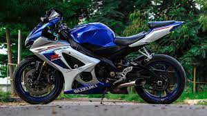 Life insurance association of malaysia guides. Blue And White Suzuki Sports Bike Parked During Daytime Photo Free Motorcycle Image On Unsplash Car Pictures Motorcycle Bike Photo