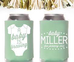 Onesie A Baby Is Brewing Baby Shower Favors Custom And Personalized Can Coolers Brew Baby Shower Baby Shower Koozies Coed Baby Shower