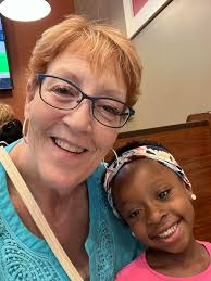 How do introverts feel when someone smiles at them?