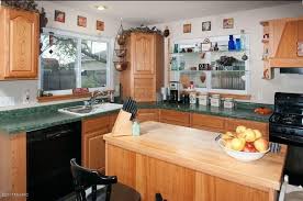 Oct 17, 2019 · in deep green, navy, or black, a dark kitchen backsplash can round out a moody kitchen or bring a touch of sophistication to a bright space. What To Do With A Kitchen With Wood Cabinets And Green Countertops Hometalk