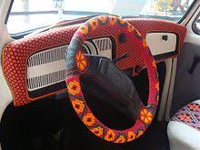 After searching around i found the steering wheel schematic that showed the resistor wiring and button configuration, and it showed that the stereo connector wires are attached at pin 18 and pin 19 of the car's stereo plug. Steering Wheel Wikipedia