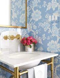 Switching out your shower curtain is a simple way to instantly upgrade your bathroom decor without breaking the bank. Marble And Brass Sink Vanity With Blue Chinoiserie Wallpaper Transitional Bathroom