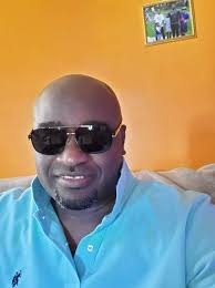 Remembering Delroy Warmington As warm as his name suggests. Whether you  call him Warmie, Big Archie, Delroy or Warmington his smile remained in  tact. His friends used the following adjectives to describe