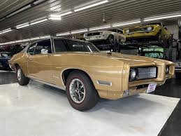 Image result for Singapore Gold 1964 GTO