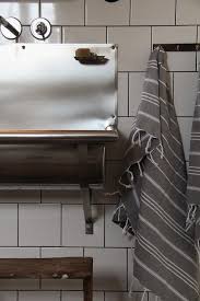 industrial kids bathroom with stainless