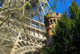The eiffel tower, the iconic parisian landmark, was constructed with latticed wrought iron. The Mystery Behind The Chimney Of The Eiffel Tower French Moments