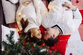 By matching outfits on september 24, 2020. Merry Christmas Couple Lay Down Under New Year Tree Red White Stock Photo Picture And Royalty Free Image Image 123758225