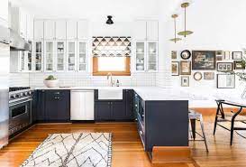 Without upper cabinets, there is plenty of room to hang shelves and other storage options. Kitchens With No Uppers Insanely Gorgeous Or Just Insane Emily Henderson