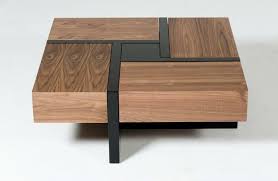 This rustic coffee table can be made in custom sizes. Lipscomb Coffee Table Has Four Hidden Drawers That Form Its Top