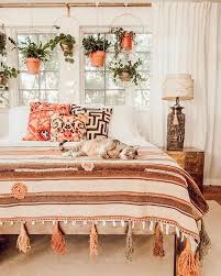 From extra mirrors to storage and paint colour, these are the best small bedroom decorating ideas to help you get the most out of a small space. Boho Bedroom With Orange Accents Urban Outfiters Bedroom Bohemian Bedroom Design Bedroom Design