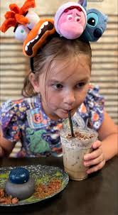 Disneyland cast members help with ghost crewneck