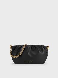 Ví cầm tay nữ | Phong cách độc quyền | CHARLES & KEITH VN
