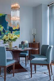 High gloss dark blue paint dining room reveal thou swell. Contemporary Blue Dining Room With Wood Table And Upholstered Blue Dining Chairs Hgtv