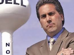 Feds move to halt sale of Adell TV station in tax fight