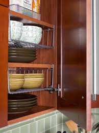 Shelving Space Inside Wall Mounted Cabinets Is Maximized With Stackable Wire Racks The Small Kitchen Storage Kitchen Storage Organization Kitchen Organization