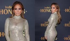 Jennifer Lopez Favors Sparkling Allure in Glittery Sheer Body-con Dress at  2024 IndieWire Honors