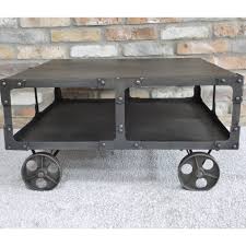 The metal wheels give it an industrial feel. Industrial Coffee Table Set On Wheels Coffee Table Industrial