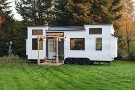 Barns and houses with board and batten siding were inspired by nordic european buildings and gained popularity in america sometime around the middle of the 19th century. Tiny House Trailer With Exterior Porch And Flexible Interior Idesignarch Interior Design Architecture Interior Decorating Emagazine