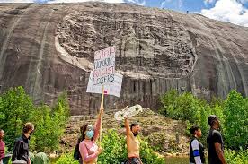 While confederate monuments are being removed nationwide, dozens of protests at the mountain. Photos Demonstrators In Stone Mountain Demand Removal Of Confederate Monuments Decaturish Locally Sourced News