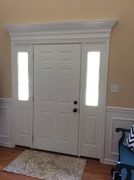 We Added Trim Molding Above Our Front Door And It Made Such A Difference Moldings And Trim Home Front Door Trims