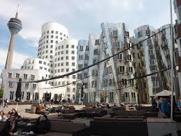 White plaster, red brick and stainless steel. Neuer Zollhof By Architect Frank Gehry Picture Of Dusseldorf North Rhine Westphalia Tripadvisor