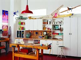If you need the garage space for other purposes, go the extra mile and convert the garage into what you really need: Wall Unit Craft Center In White Craft Room Design Craft Room Design Ideas Diy Furniture