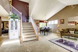 This calculation comes from a 320 square foot living room in a 2000 square foot home. House Interior With High Vaulted Ceiling Living Room With Diining Area And Staircase View Stock Photo Picture And Royalty Free Image Image 30094756