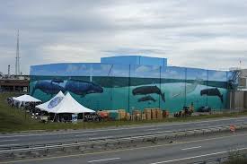 ww 93 great whales of new bedford west terminal maritime terminal inc new bedford mass 700 feet long x 45 feet high wyland marine life art wyland art ww 93 great whales of new bedford