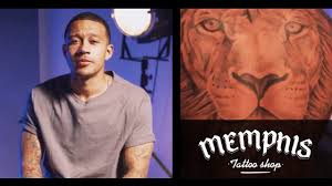 Memphis opens up about his most meaningful tattoos 🦁 i have the heart of a lion. Memphis Tattoo Shop Football Soccer Youtube