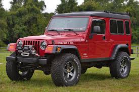 Image result for Flame Red 2005 Jeep
