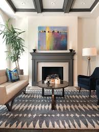 Living Room Design Featuring Grey Fireplace And Graphic Rug In Chicago Il By London Walder Chicago Interior Design Interior Design Chicago Living Room Designs