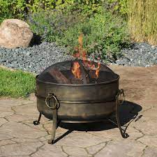 The cauldron fire pit includes wire mesh spark screen to safely enjoy fires, screen lifting tool, log grate and protective outdoor cover for functional safety. 24 Fire Pit Steel With Black Finish Cauldron Style With Spark Screen Overstock 11594239