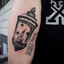Traditional dagger and lantern tattoo on arm sleeve by nick rodin. Black Lantern Tattoo Tattoogrid Net