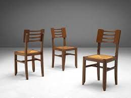 Set Of Four Dining Chairs By Pierre Cruege In Oak And Cane France 1940s Dining Chairs Fabric Dining Room Chairs Dining Room Chairs Modern