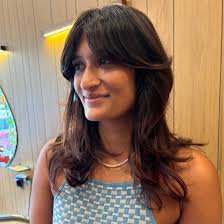 soft fluffy curtain bangs and layers for @michelle.raya 🧡 . . . .  #longhairstyles #longhair #naturalredhead #curtainbangs #70shair  #70sfashion #longshag #brooklynhairstylist #brooklynhairsalon #brooklynhair