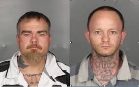 Two men held in serious beating, also facing other charges