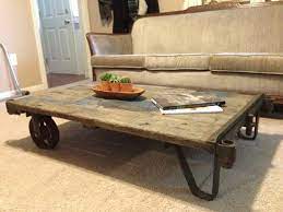 This coffee table is made from an old warehouse cart. Sold Vintage Industrial Cart Refurbished As A By Sewdowngoods 400 00 Cart Coffee Table Coffee Table Vintage Cart