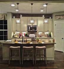 Whether you're looking for lights for kitchen islands or hanging lights for above a bathroom vanity, pendants are a versatile design option. Wonderful Image Of Lighting Fixtures Over Kitchen Island Interior Design Ideas Home Decorating Inspiration Moercar Kitchen Remodel Layout Rustic Kitchen Kitchen Remodel