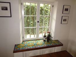 To further protect your window sill, you can also apply a translucent varnish over the stain. Try Using Morocan Or Patterned Tiles To Create A Window Feature By Applying Them To Your Window Sill Absolutely Beau Window Sill Decor Tiled Window Sill Home